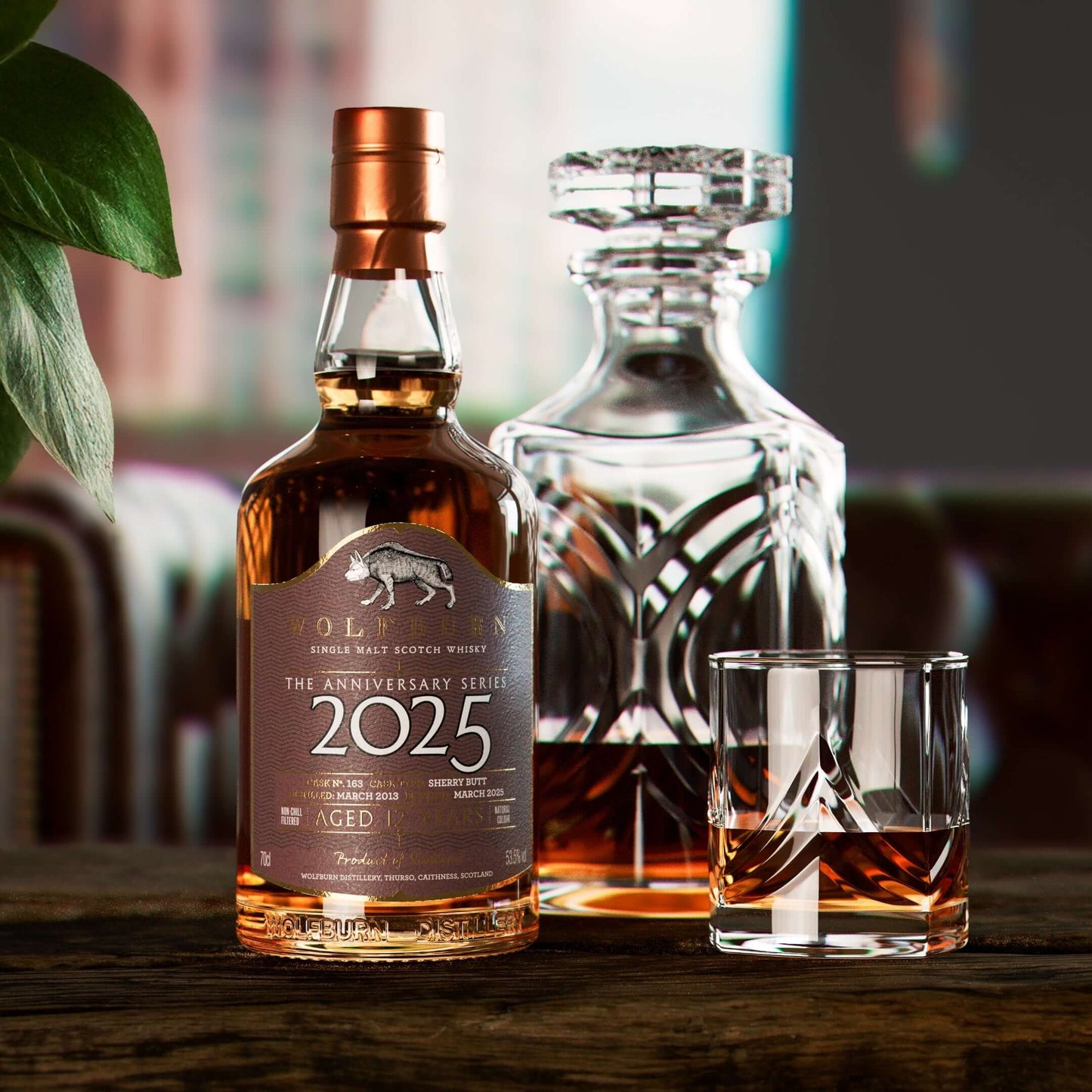 2025 Anniversary Series with decanter on desk