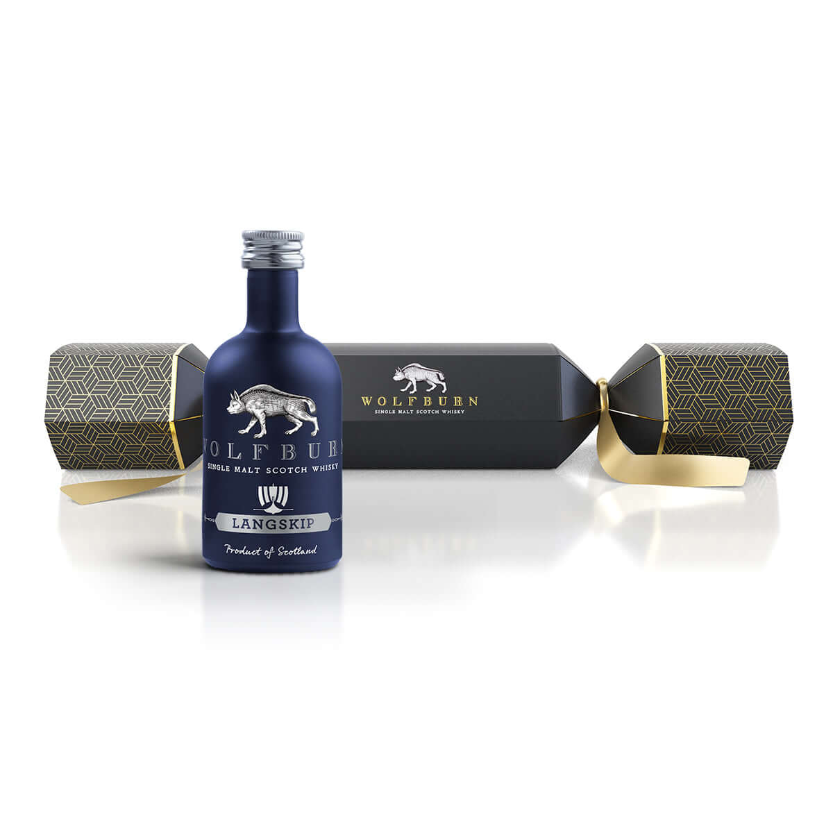 Blue bottle of Wolfburn Langskip whisky with packaging on a white background