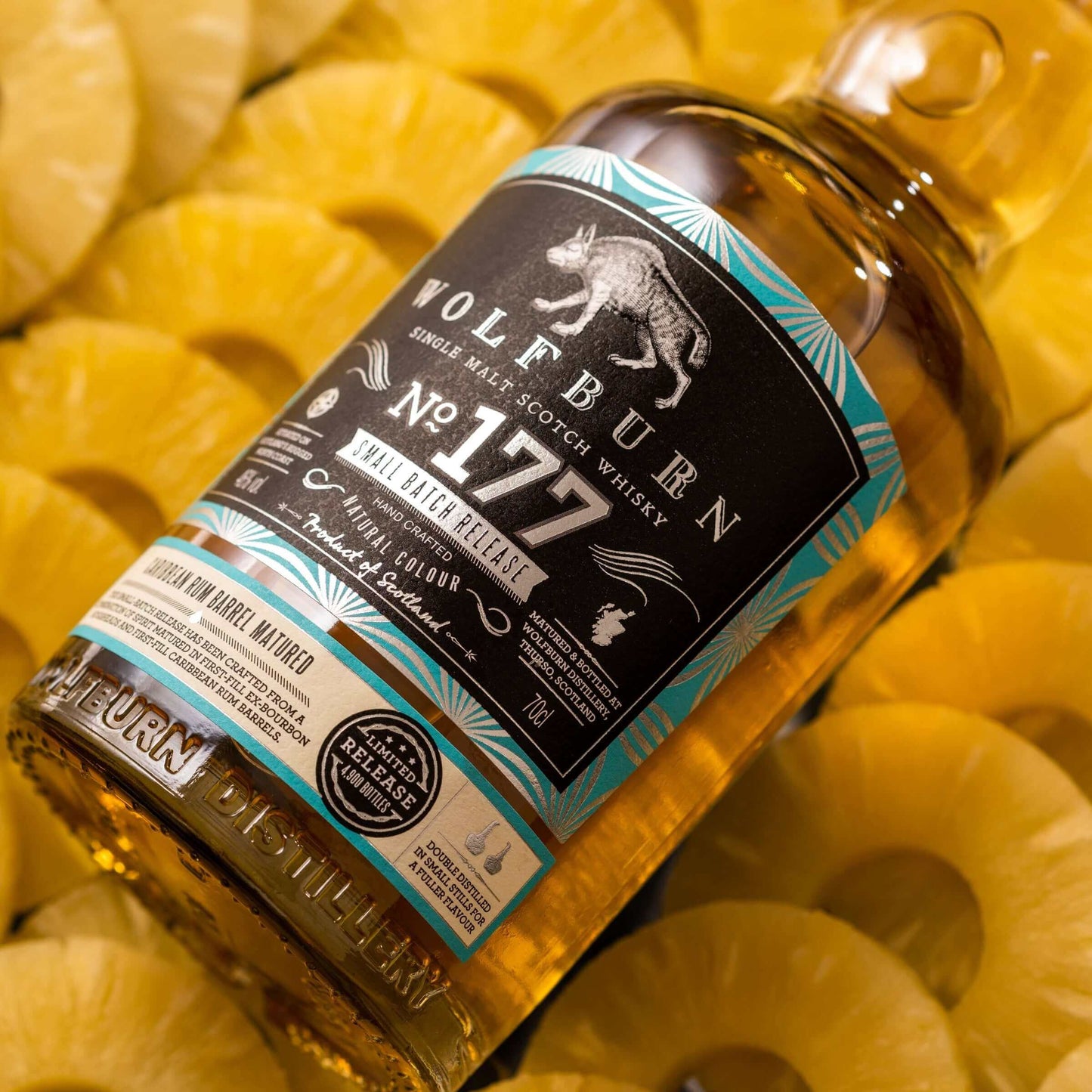 Wolfburn Small Batch 177 - 46% vol. 70cl Batch 177 has been crafted from a combination of spirit matured for eight years in first-fill ex-bourbon hogsheads, married with spirit matured for seven years in first-fill Caribbean rum barrels. The flavour of th