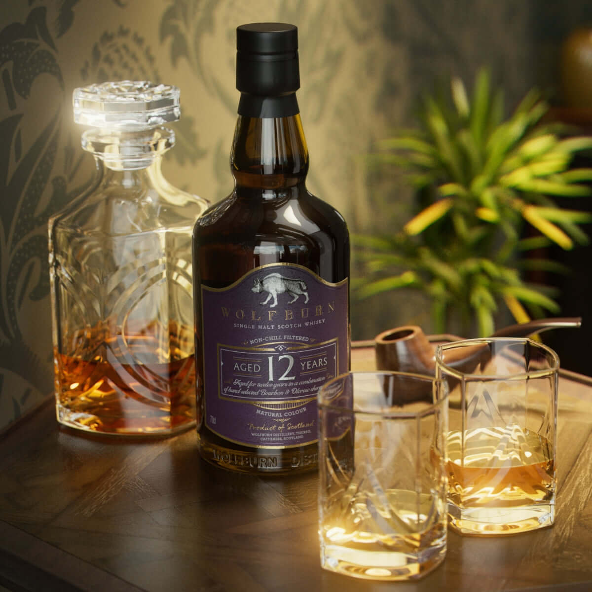 12 Year Old Single Malt Scotch Whisky bottle with two glasses and a decanter on a wooden tray.