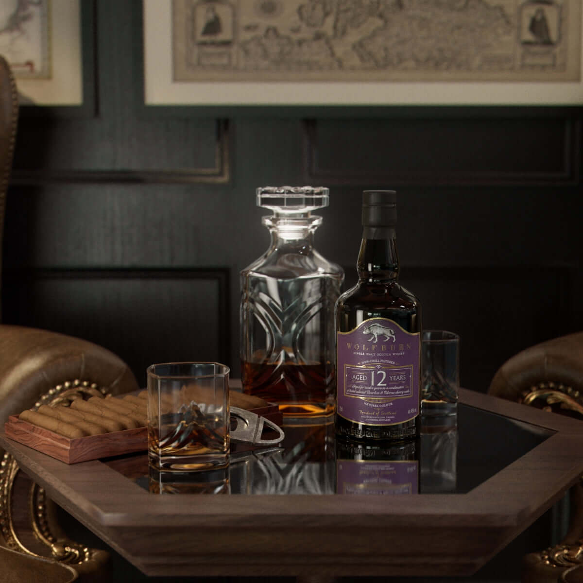 12 Year Old Single Malt Scotch Whisky bottle next to glasses and a decanter on a wooden table.