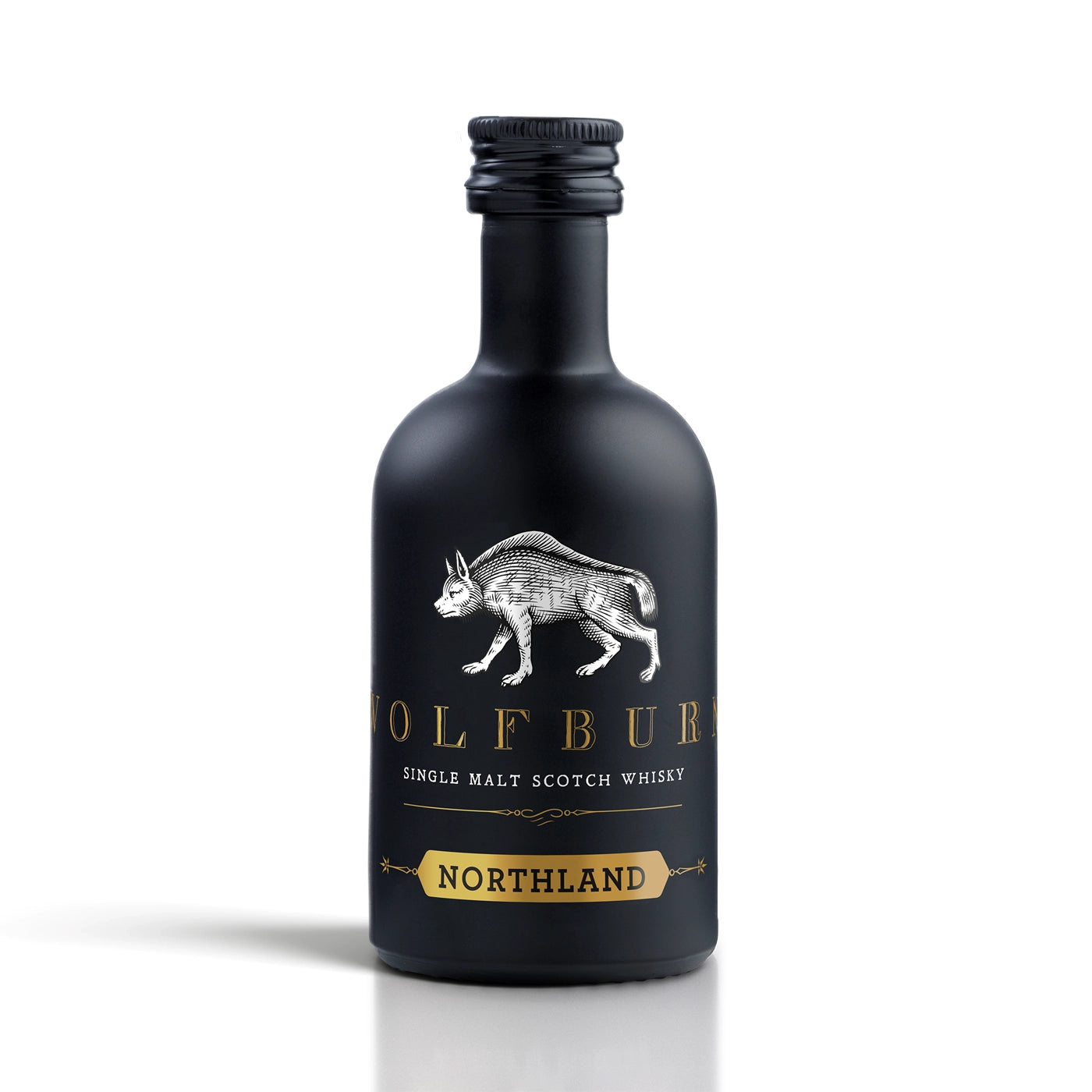 Black miniature bottle of Wolfburn Northland single malt Scotch whisky on a white background