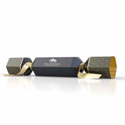 Black cracker with gold accents and Wolfburn logo on a white background