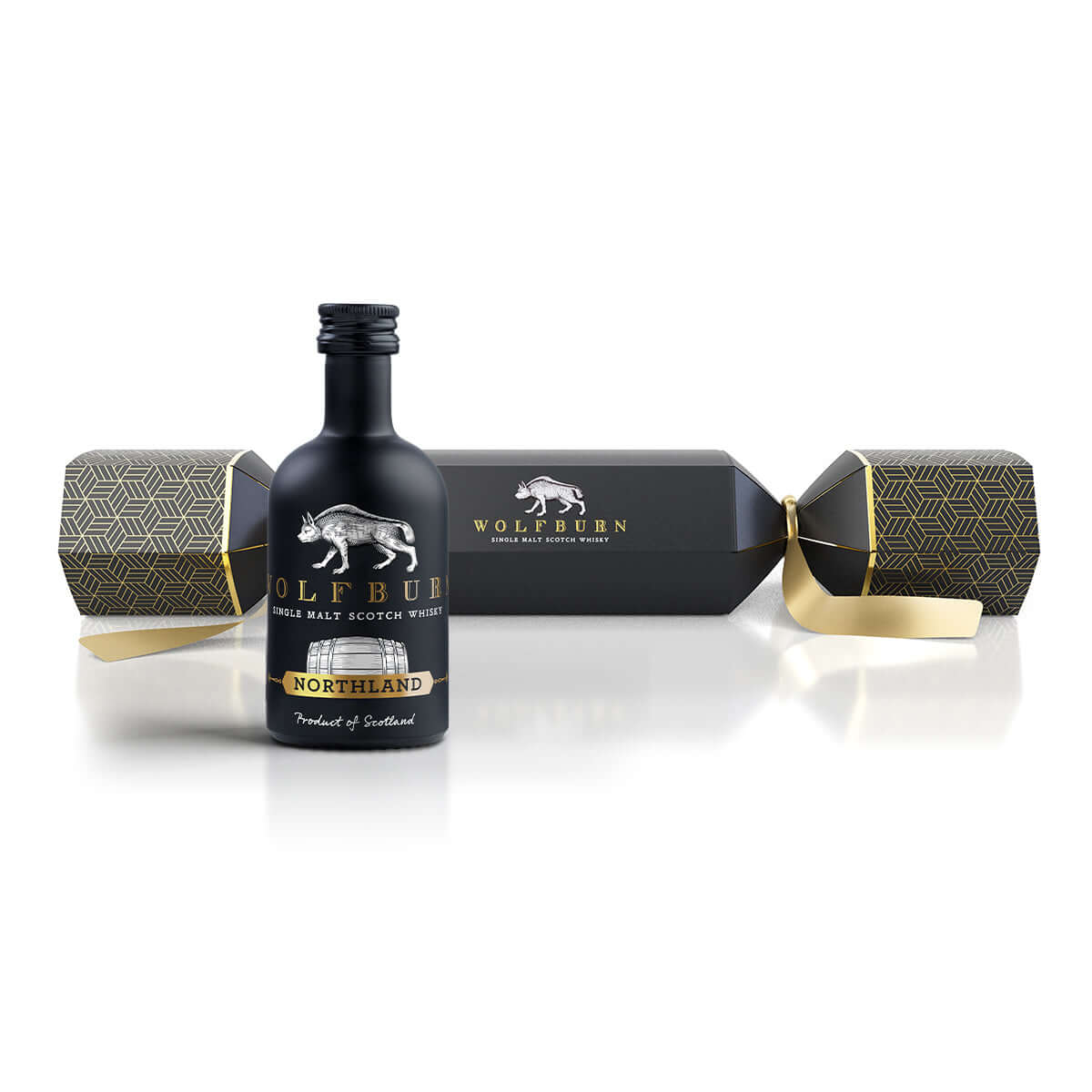 Black bottle of Wolfburn Northland whisky with packaging on a white background