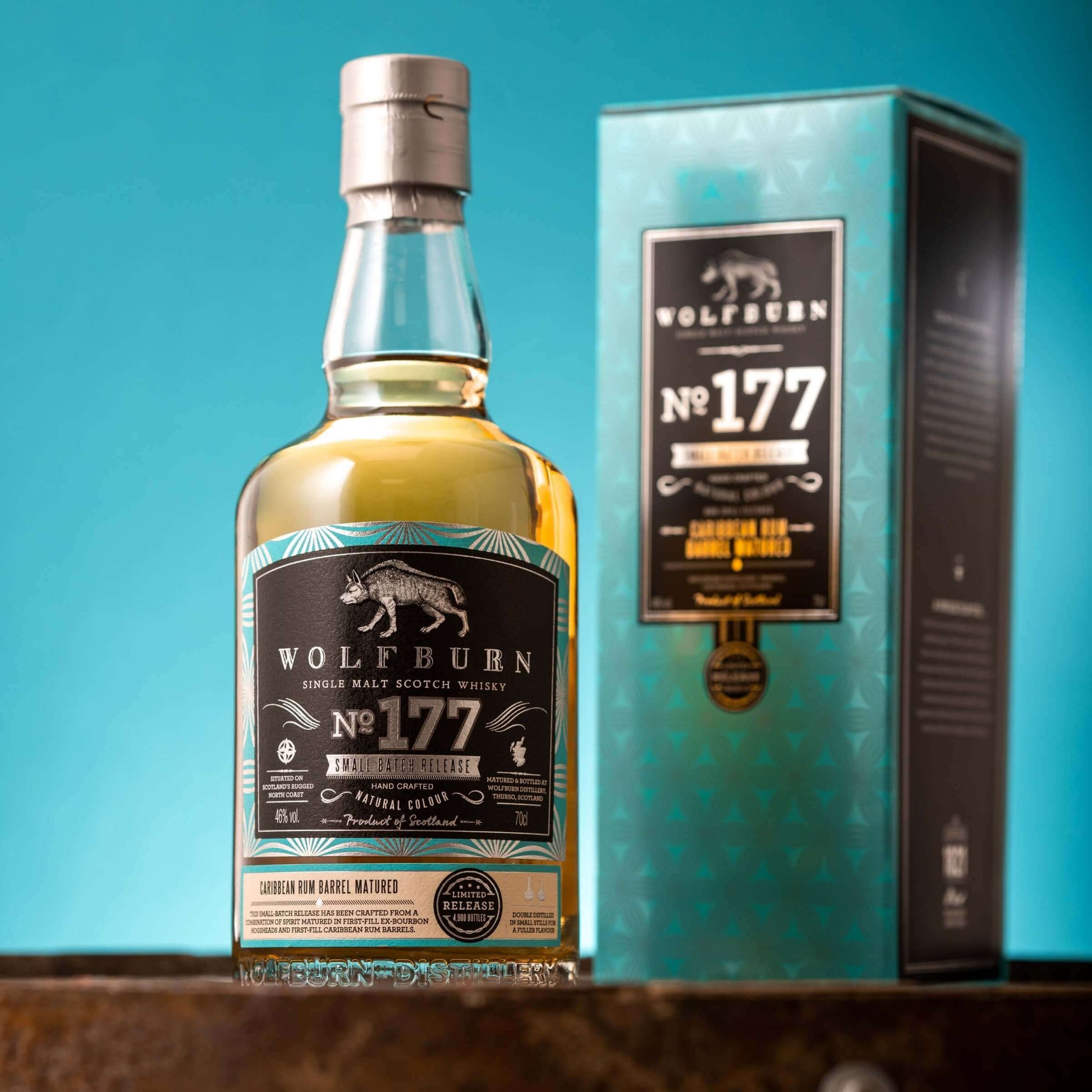 Wolfburn Small Batch 177 - 46% vol. 70cl Batch 177 has been crafted from a combination of spirit matured for eight years in first-fill ex-bourbon hogsheads, married with spirit matured for seven years in first-fill Caribbean rum barrels. The flavour of th