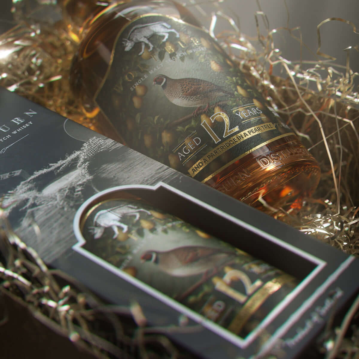 Whisky bottle with decorative label in a gift box on a textured surface