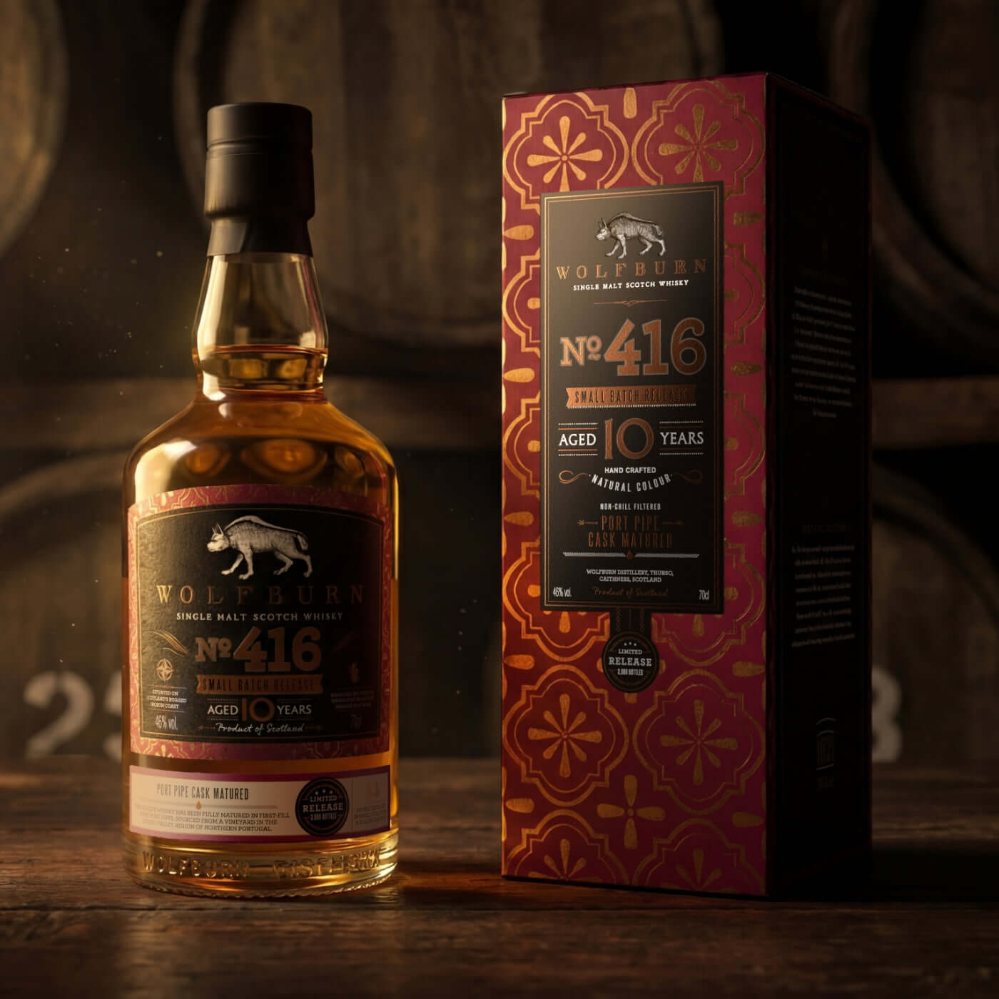 Small Batch 416 Single Malt Scotch Whisky bottle and packaging, aged 10 years, displayed against wooden casks.