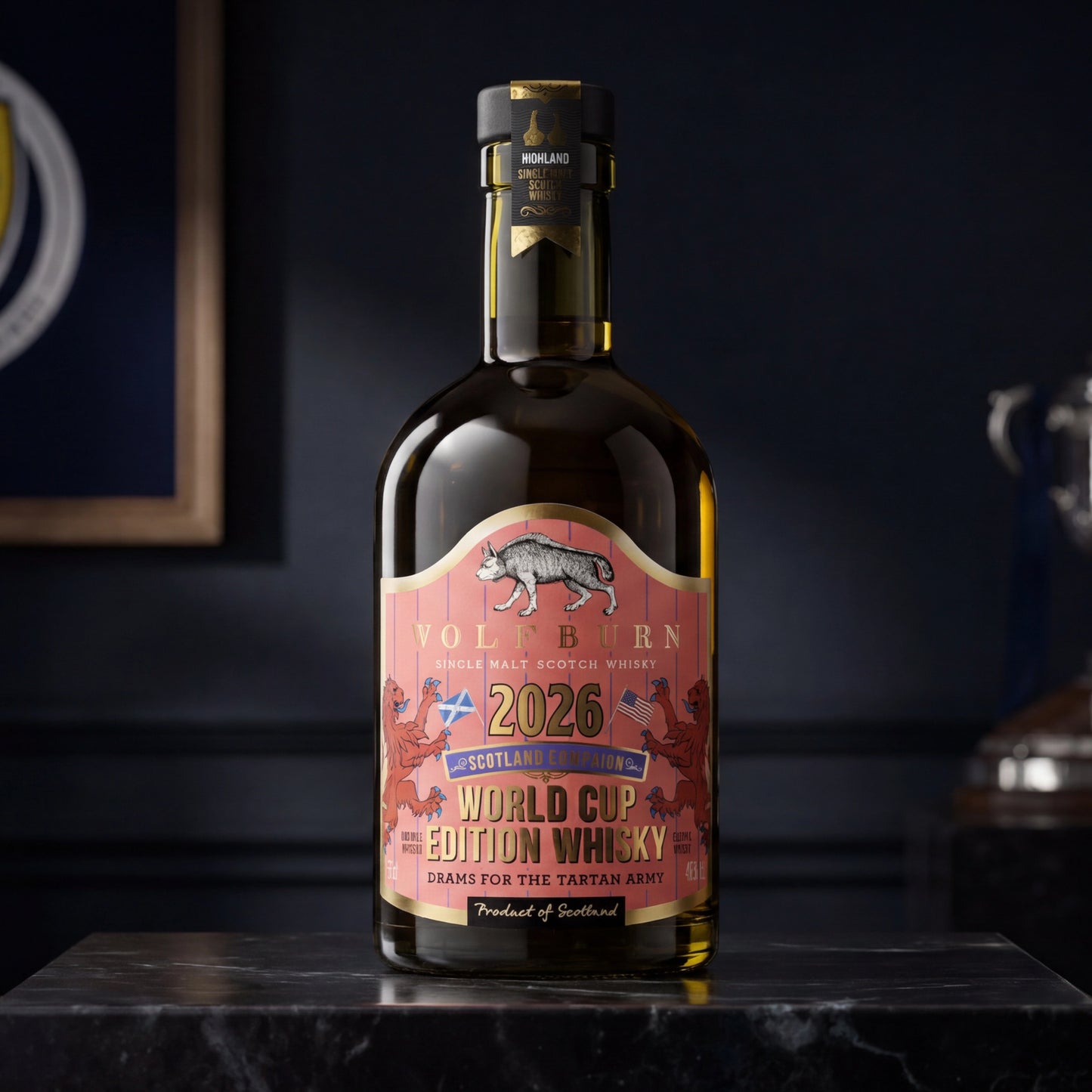 Wolfburn Morven World Cup Edition 2026 Highland Single Malt Scotch Whisky collector's bottle on marble plinth with Scotland crest and trophy in background, coral pinstripe label with Saltire and US flag