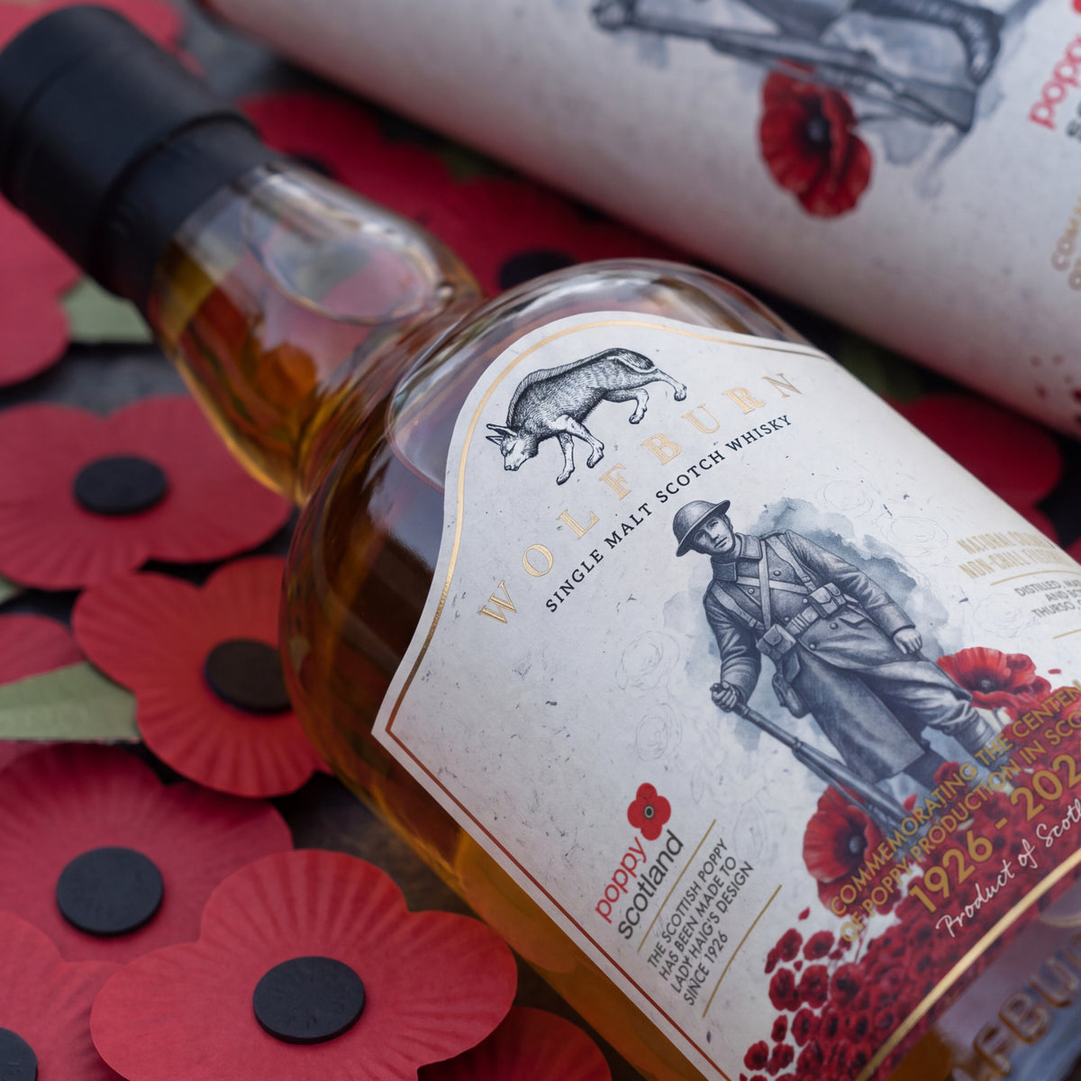 Close-up of the Wolfburn Poppyscotland whisky label showing a First World War soldier among Scottish poppies, 1926 to 2026