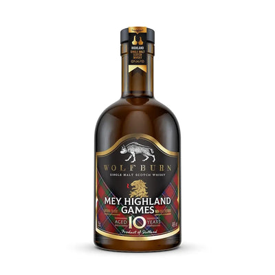 A bottle of Wolfburn '35cl Mey Highland Games' aged 10 years single malt Scotch whisky, featuring a dark label with gold lettering and a wolf graphic, set against a plain white background.