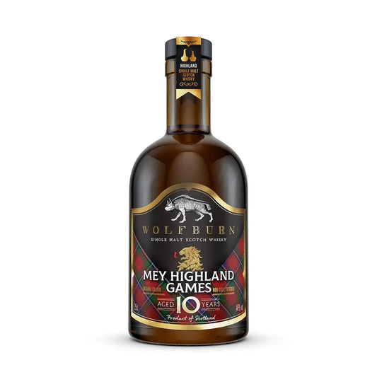 A bottle of Wolfburn '35cl Mey Highland Games' aged 10 years single malt Scotch whisky, featuring a dark label with gold lettering and a wolf graphic, set against a plain white background.